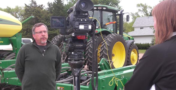 •	Row crop farmer Bart Ruth of Rising City, Nebraska answers questions from a TV reporter.  Ruth Farms was one of the stops on an A-FAN media tour. 