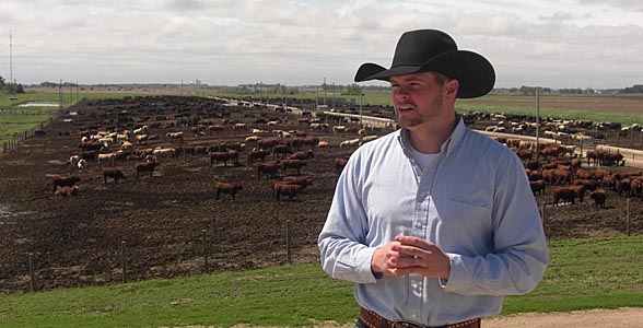 •	Cattle feeder Hank Klosterman of David City discusses his operation during an A-FAN media tour of eastern Nebraska farms.