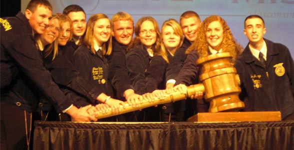 The new Wisconsin State FFA Officer Team brings the gavel down on the 84th annual State Convention.