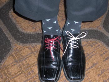 Shoes on the feet of Chris Novak, National Pork Board CEO