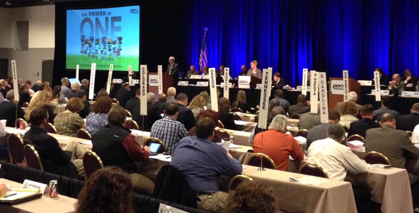 Pork Checkoff outgoing President Karen Richter addresses delegates at the National Pork Board Meeting in Kansas City.