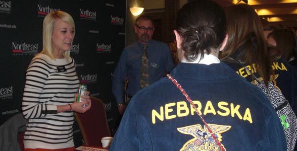 Joni Cassidy of Northeast Community College visits with prospective students at the Nebraska FFA Convention.