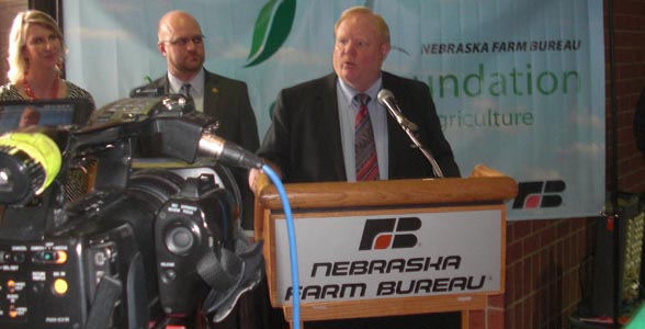Nebraska Farm Bureau president Steve Nelson announces a new school loan assistance program for ag education teachers at the Nebraska FFA Convention.