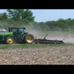 SC Minnesota farmer uses rotary hoe to spring corn